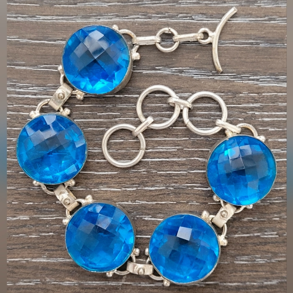 925 marked artisan silver bracelet with sparkling blue glass crystals